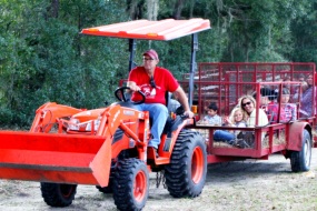 a man riding on the back of a truck
